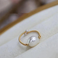 14K Gold Pearl Ring with Winding Design